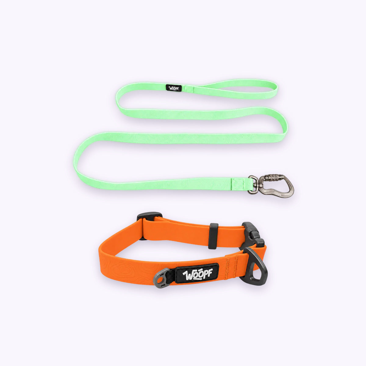 Orange | Swimmer Bundle: The Orange Sealskin Waterproof Dog Collar with the Glow Sealskin Lightweight Waterproof Leash on a pale lavender background
