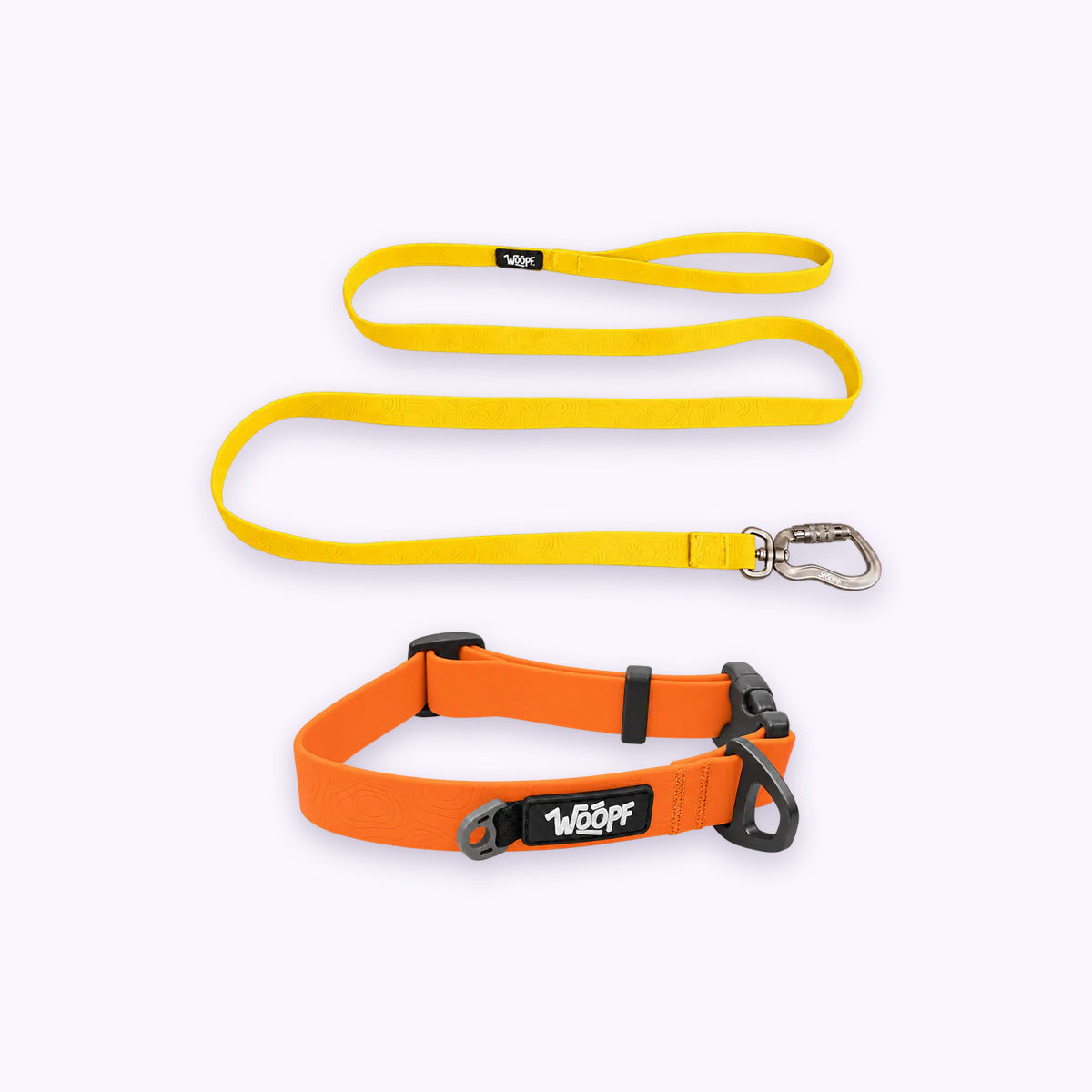 Orange | Swimmer Bundle: The Orange Sealskin Waterproof Dog Collar with the Yellow Sealskin Lightweight Waterproof Leash on a pale lavender background