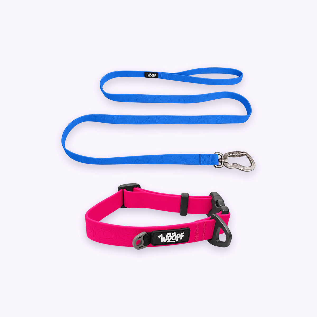 Pink | Swimmer Bundle: The Pink Sealskin Waterproof Dog Collar with the Blue Sealskin Lightweight Waterproof Leash on a pale lavender background