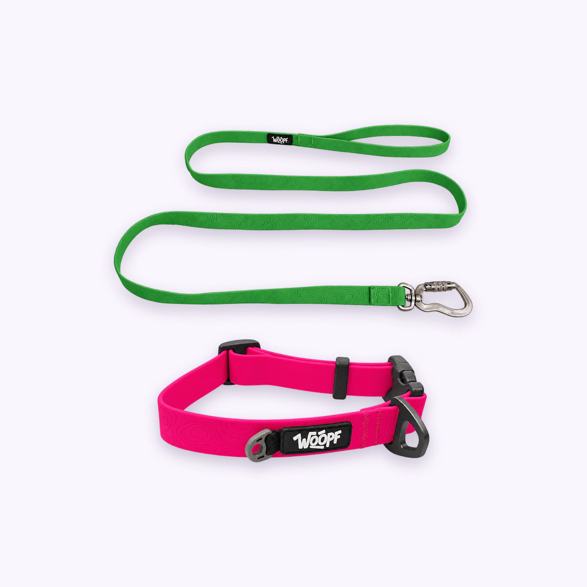 Pink | Swimmer Bundle: The Pink Sealskin Waterproof Dog Collar with the Green Sealskin Lightweight Waterproof Leash on a pale lavender background
