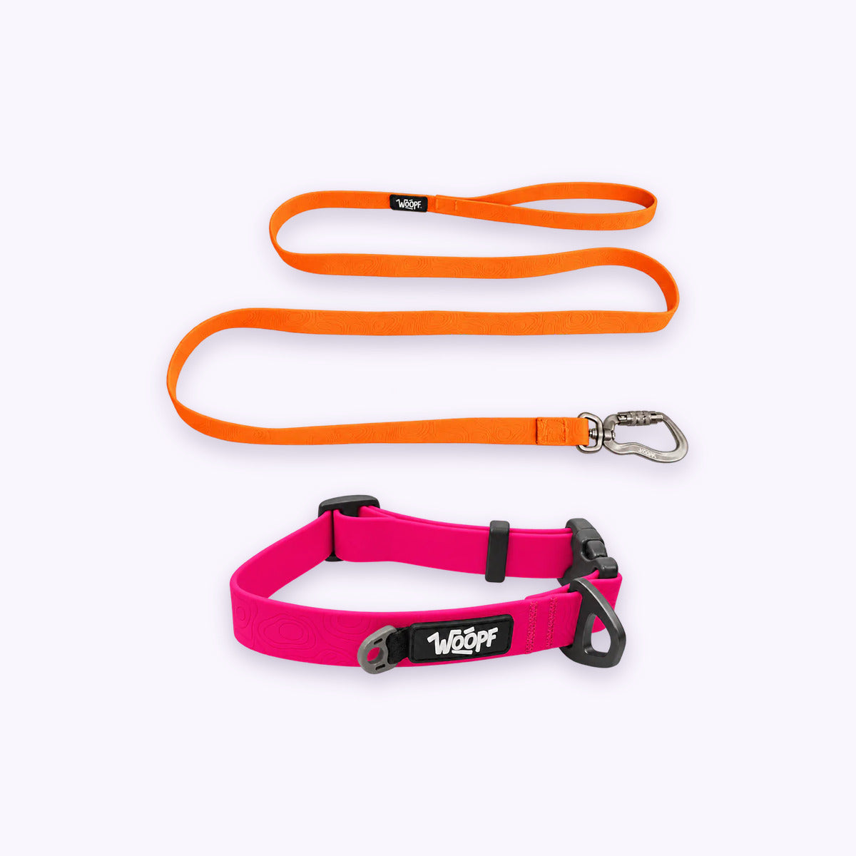 Pink | Swimmer Bundle: The Pink Sealskin Waterproof Dog Collar with the Orange Sealskin Lightweight Waterproof Leash on a pale lavender background