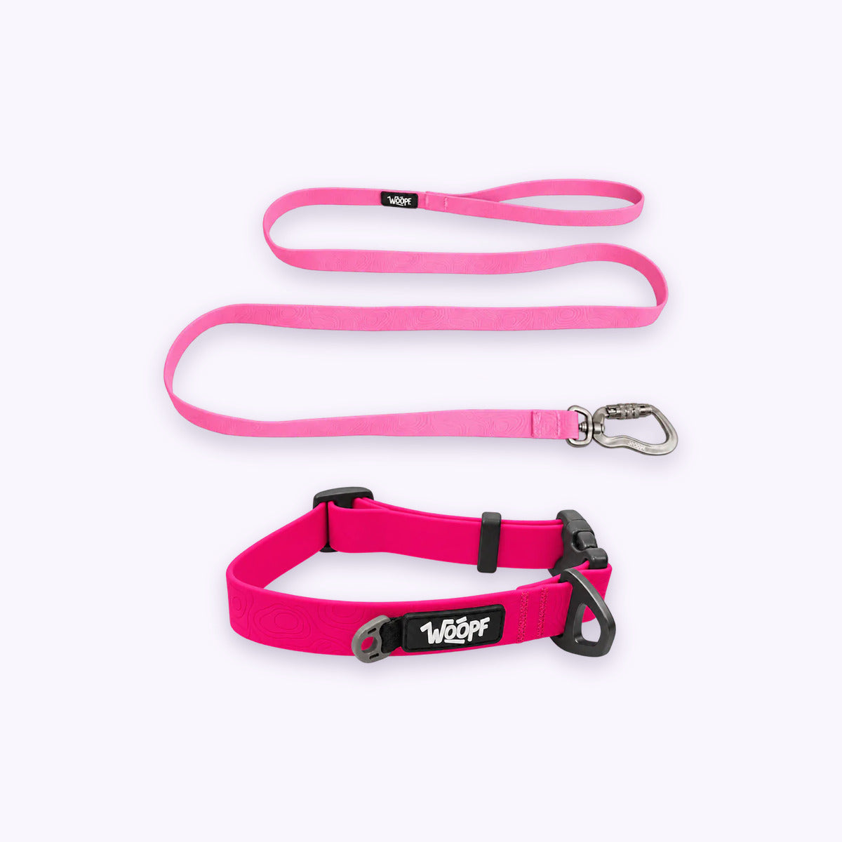 Pink | Swimmer Bundle: The Pink Sealskin Waterproof Dog Collar with the Pink Sealskin Lightweight Waterproof Leash on a pale lavender background