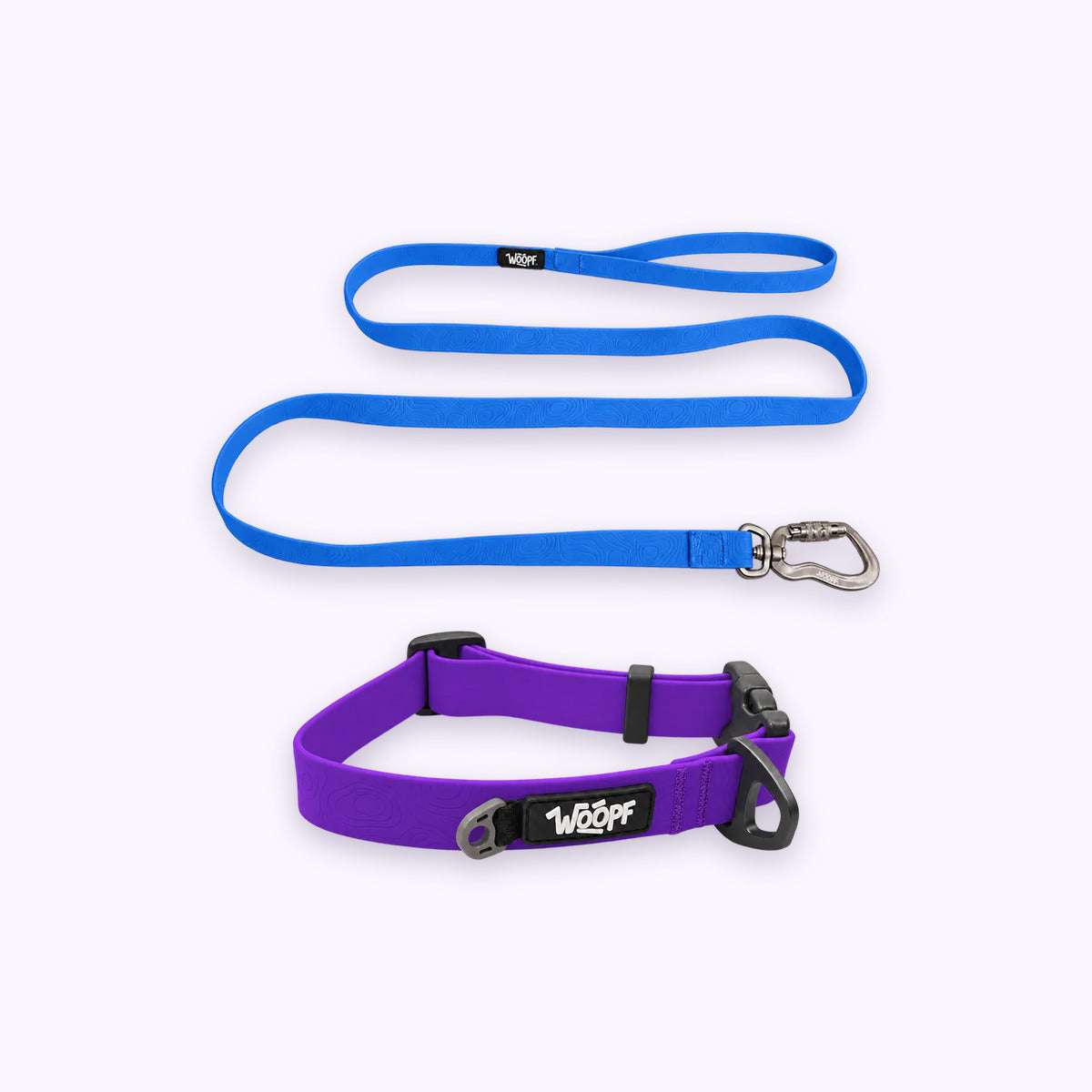 Purple | Swimmer Bundle: The Purple Sealskin Waterproof Dog Collar with the Blue Sealskin Lightweight Waterproof Leash on a pale lavender background