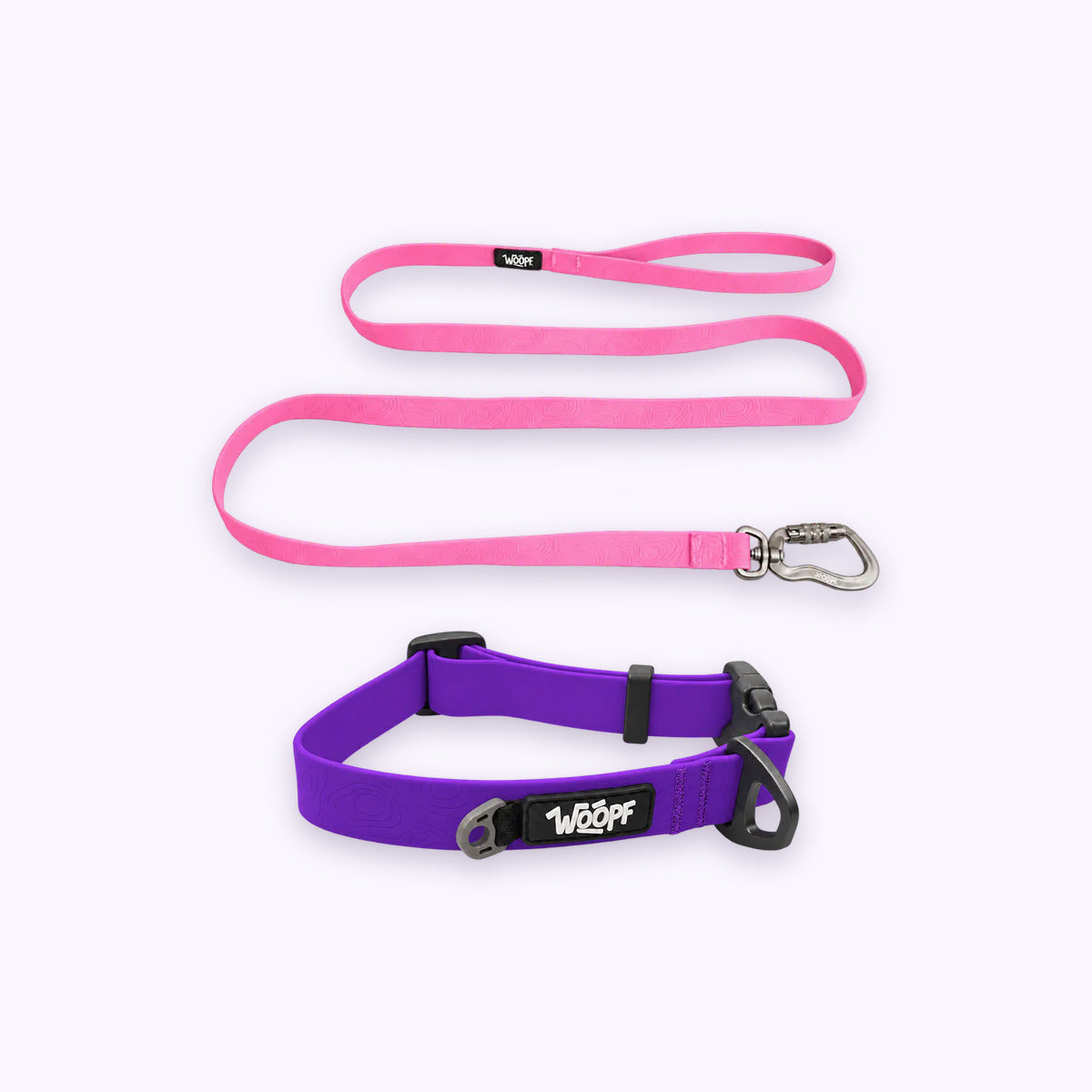 Purple | Swimmer Bundle: The Purple Sealskin Waterproof Dog Collar with the Pink Sealskin Lightweight Waterproof Leash on a pale lavender background