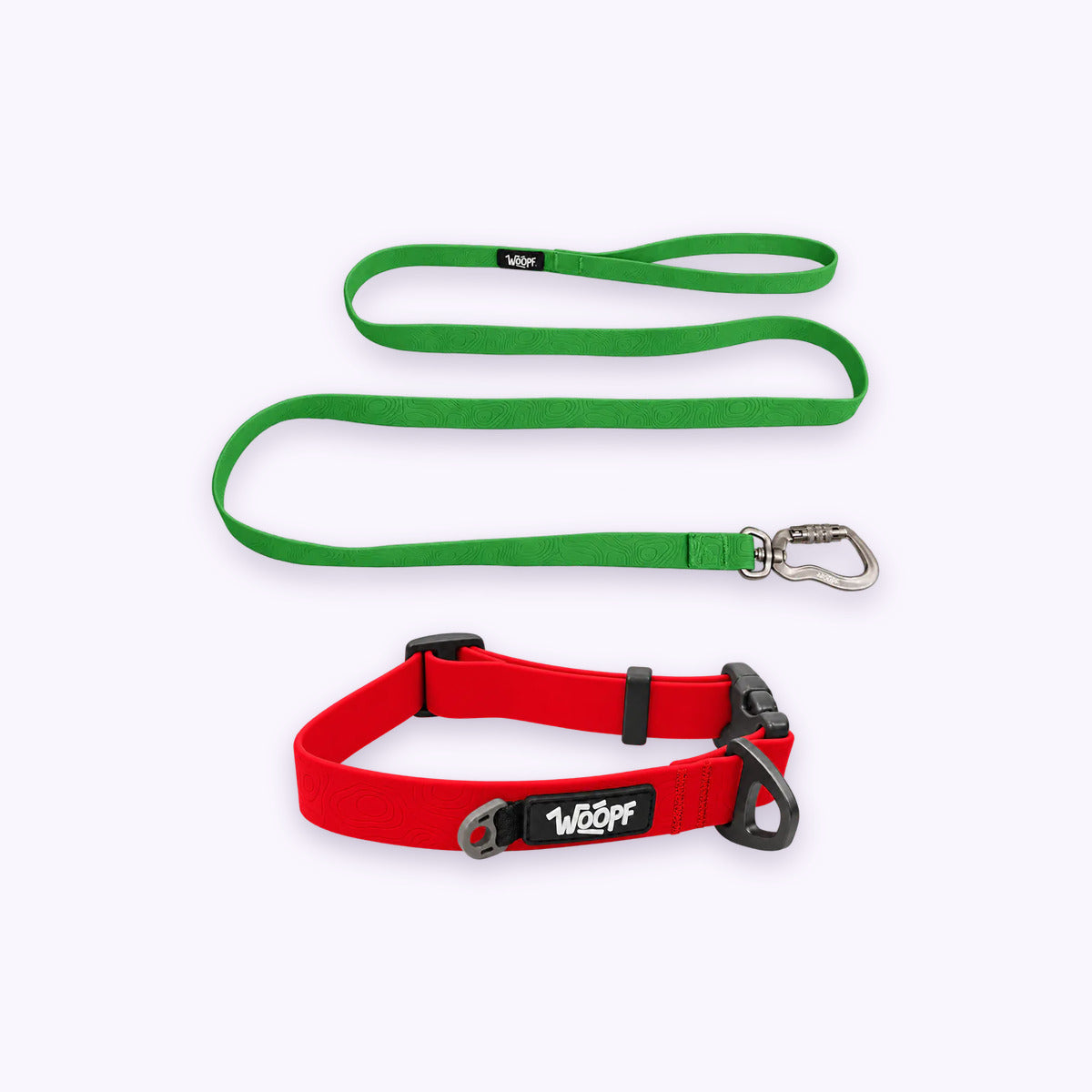 Red | Swimmer Bundle: The Red Sealskin Waterproof Dog Collar with the Green Sealskin Lightweight Waterproof Leash on a pale lavender background