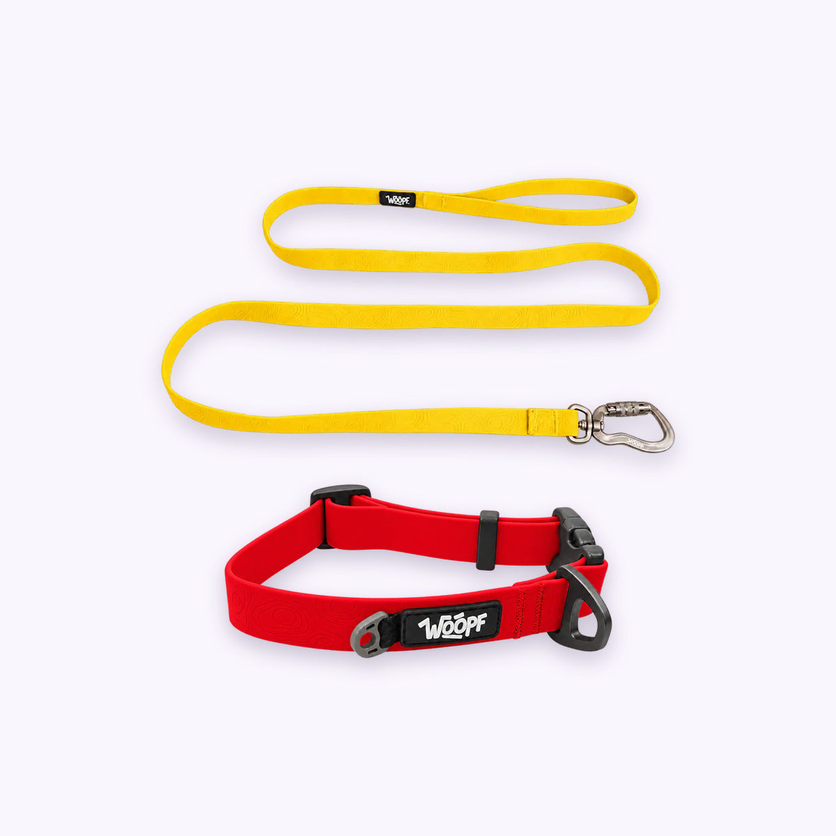 Red | Swimmer Bundle: The Red Sealskin Waterproof Dog Collar with the Yellow Sealskin Lightweight Waterproof Leash on a pale lavender background