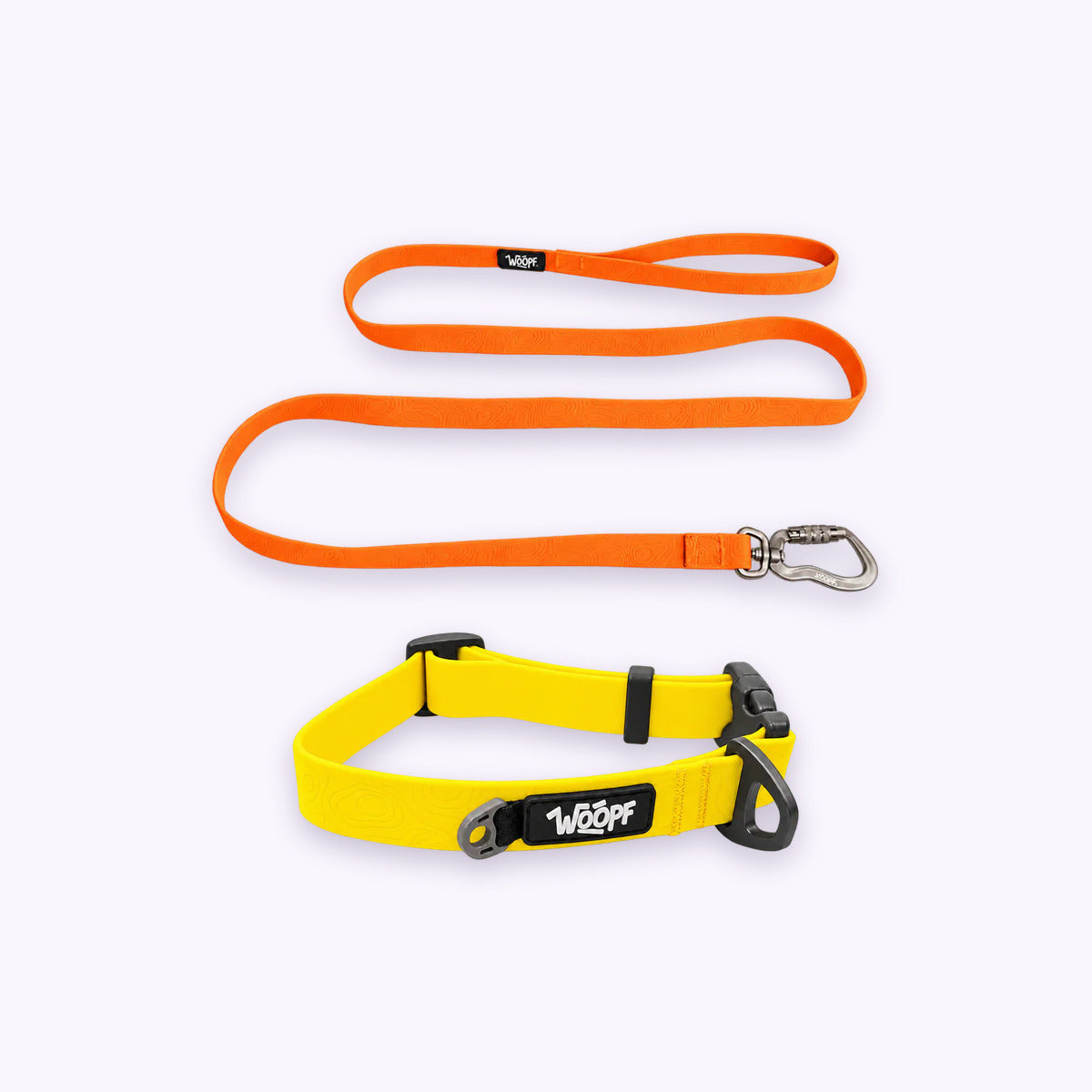 Yellow | Swimmer Bundle: The Yellow Sealskin Waterproof Dog Collar with the Orange Sealskin Lightweight Waterproof Leash on a pale lavender background