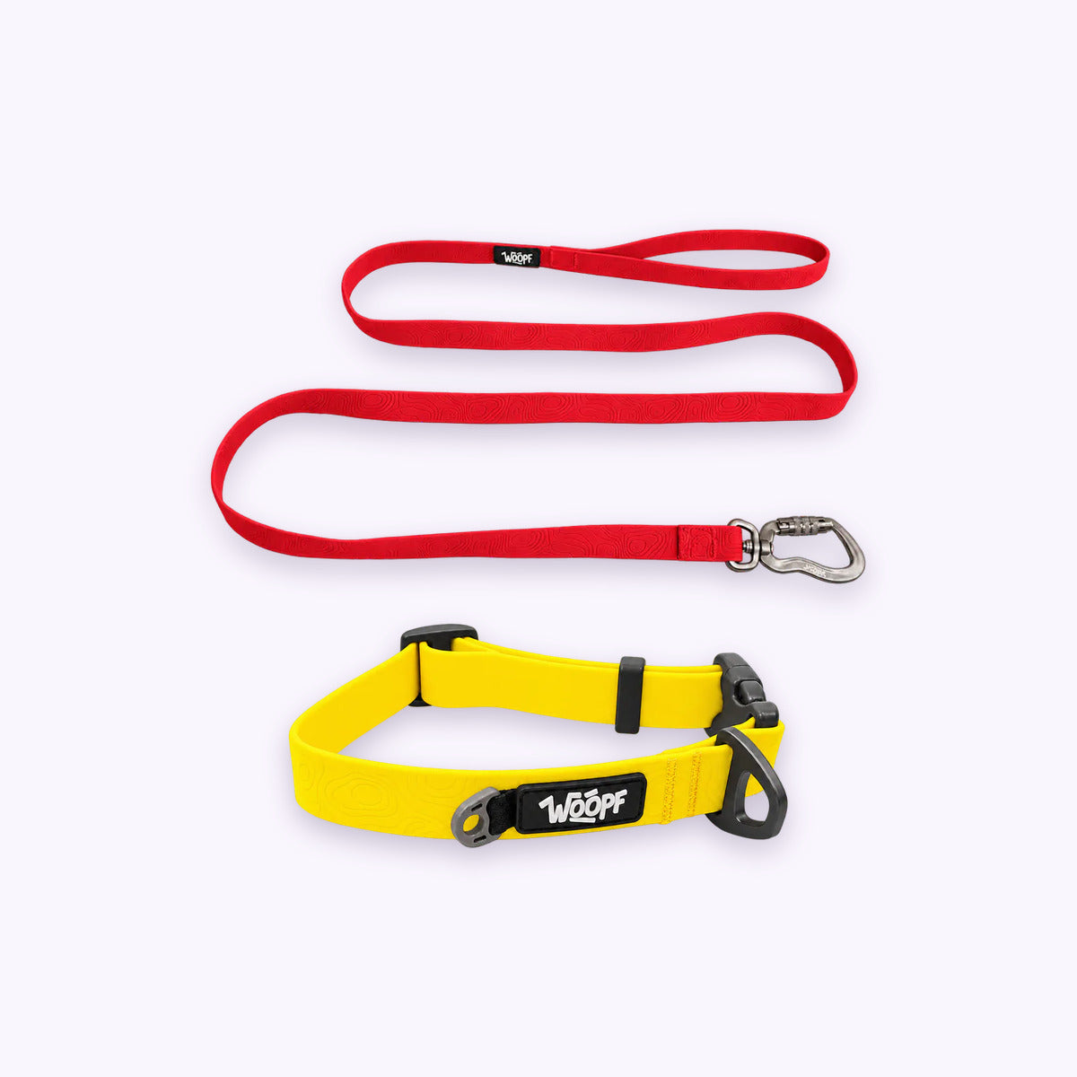 Yellow | Swimmer Bundle: The Yellow Sealskin Waterproof Dog Collar with the Red Sealskin Lightweight Waterproof Leash on a pale lavender background