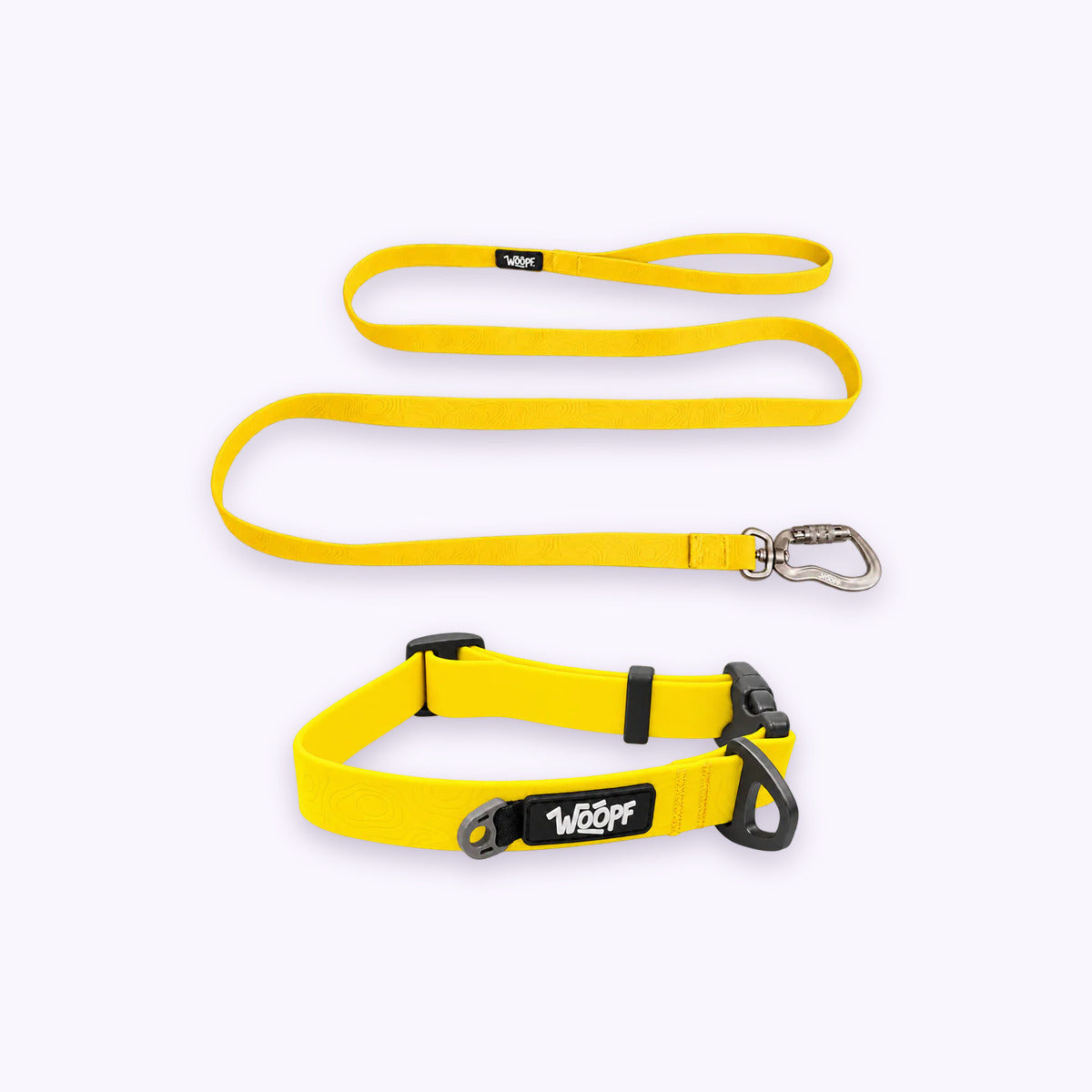 Yellow | Swimmer Bundle: The Yellow Sealskin Waterproof Dog Collar with the Yellow Sealskin Lightweight Waterproof Leash on a pale lavender background