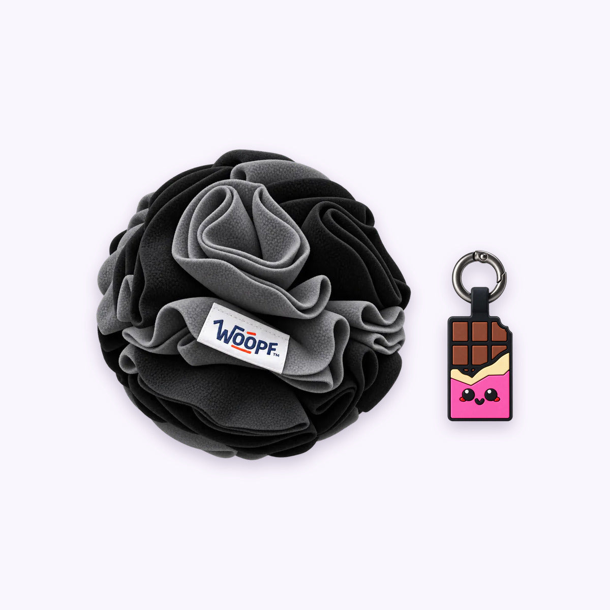 Black | Tag & Sniff Bundle: The Black Snuffle Ball with the Chocolate Pink Smart ID Tag on a pale lavender background