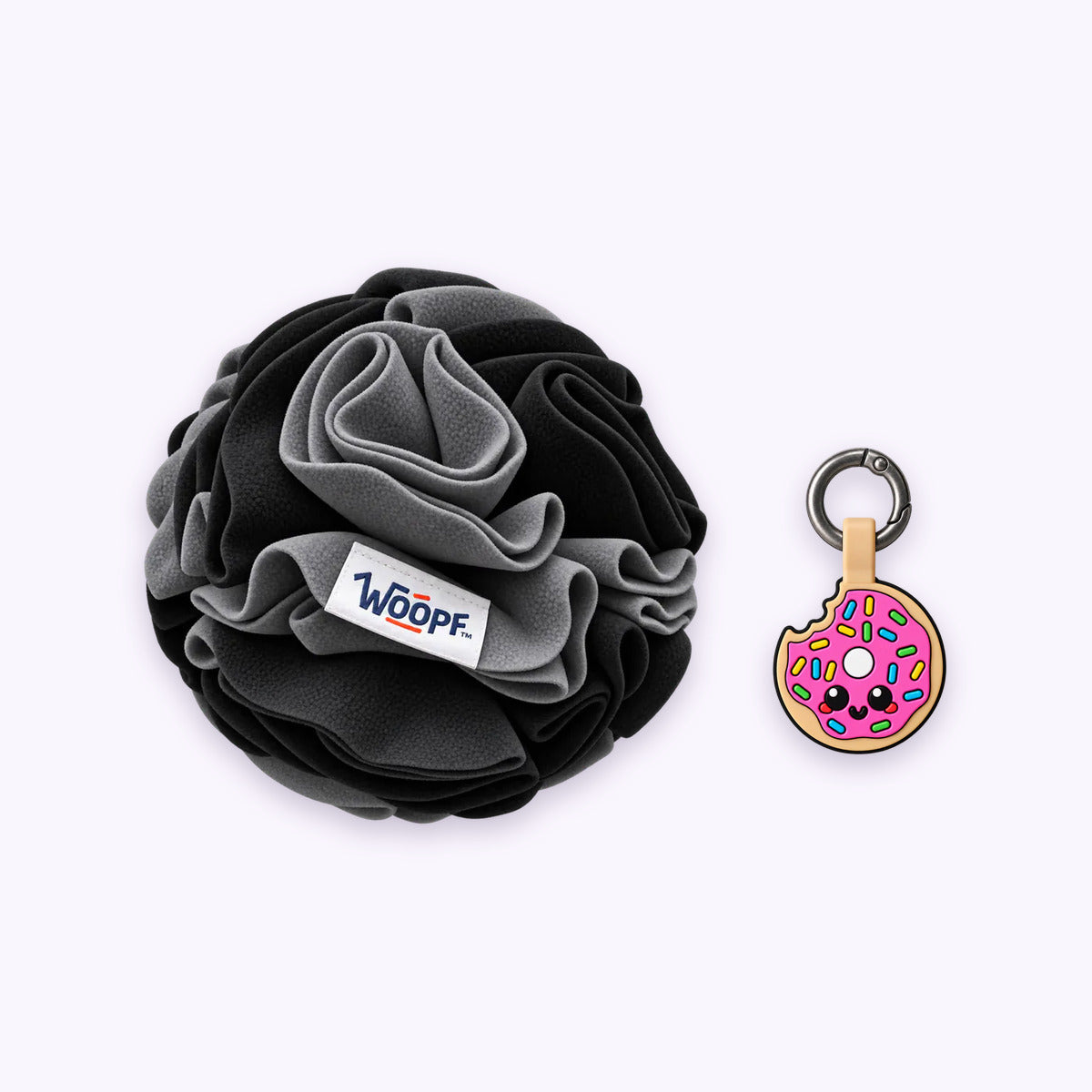 Black | Tag & Sniff Bundle: The Black Snuffle Ball with the Donut Smart ID Tag on a pale lavender background