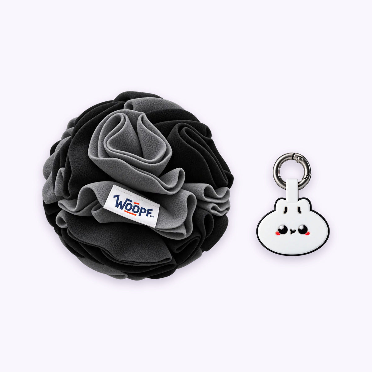 Black | Tag & Sniff Bundle: The Black Snuffle Ball with the Dumpling Smart ID Tag on a pale lavender background