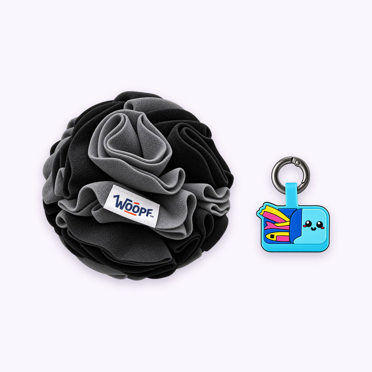 Black | Tag & Sniff Bundle: The Black Snuffle Ball with the Sardines Smart ID Tag on a pale lavender background