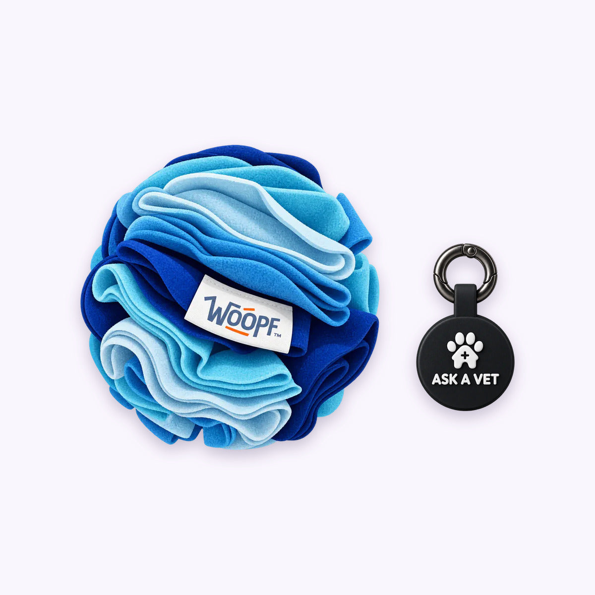 Blue | Tag & Sniff Bundle: The Blue Snuffle Ball with the Black Smart ID Tag on a pale lavender background