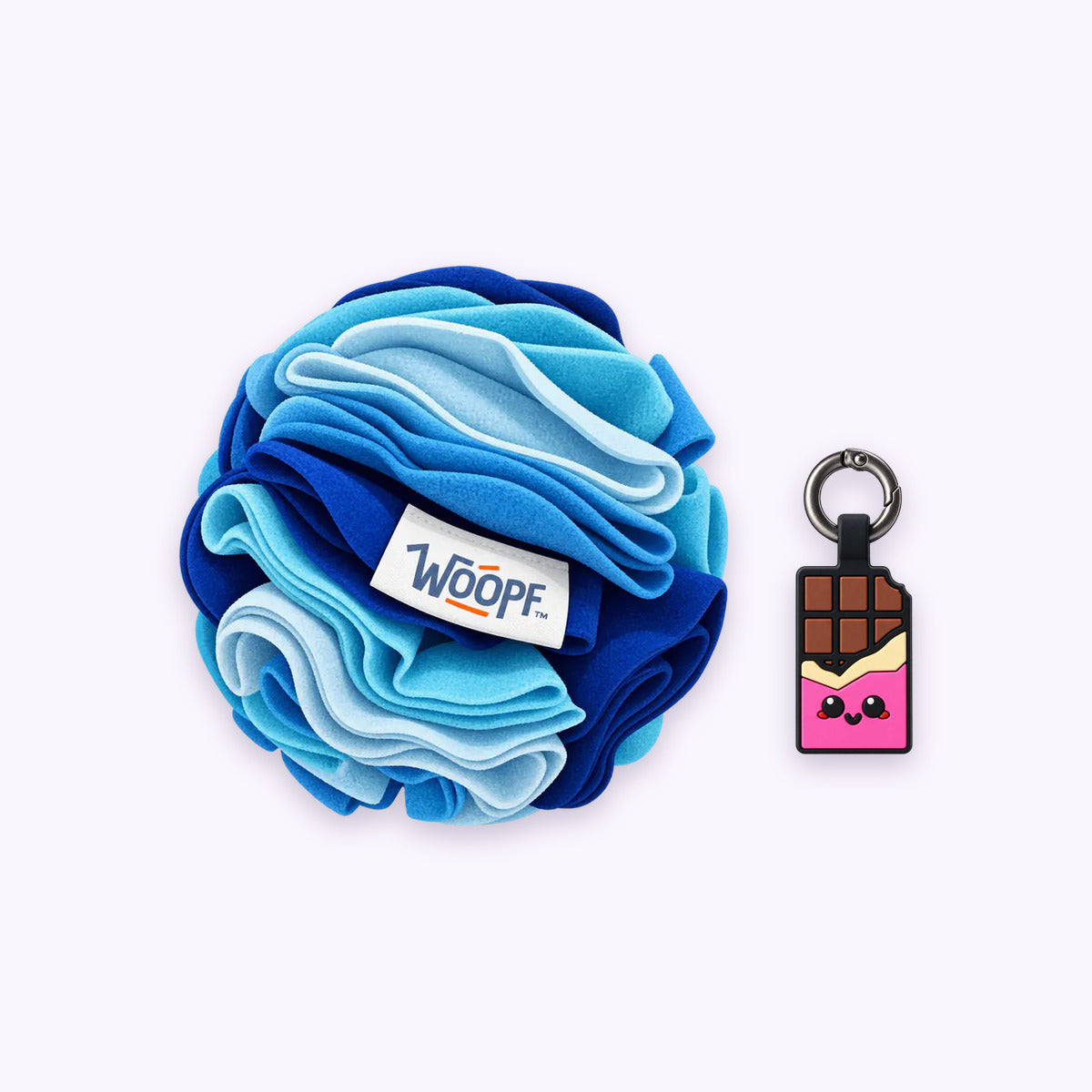 Blue | Tag & Sniff Bundle: The Blue Snuffle Ball with the Chocolate Pink Smart ID Tag on a pale lavender background