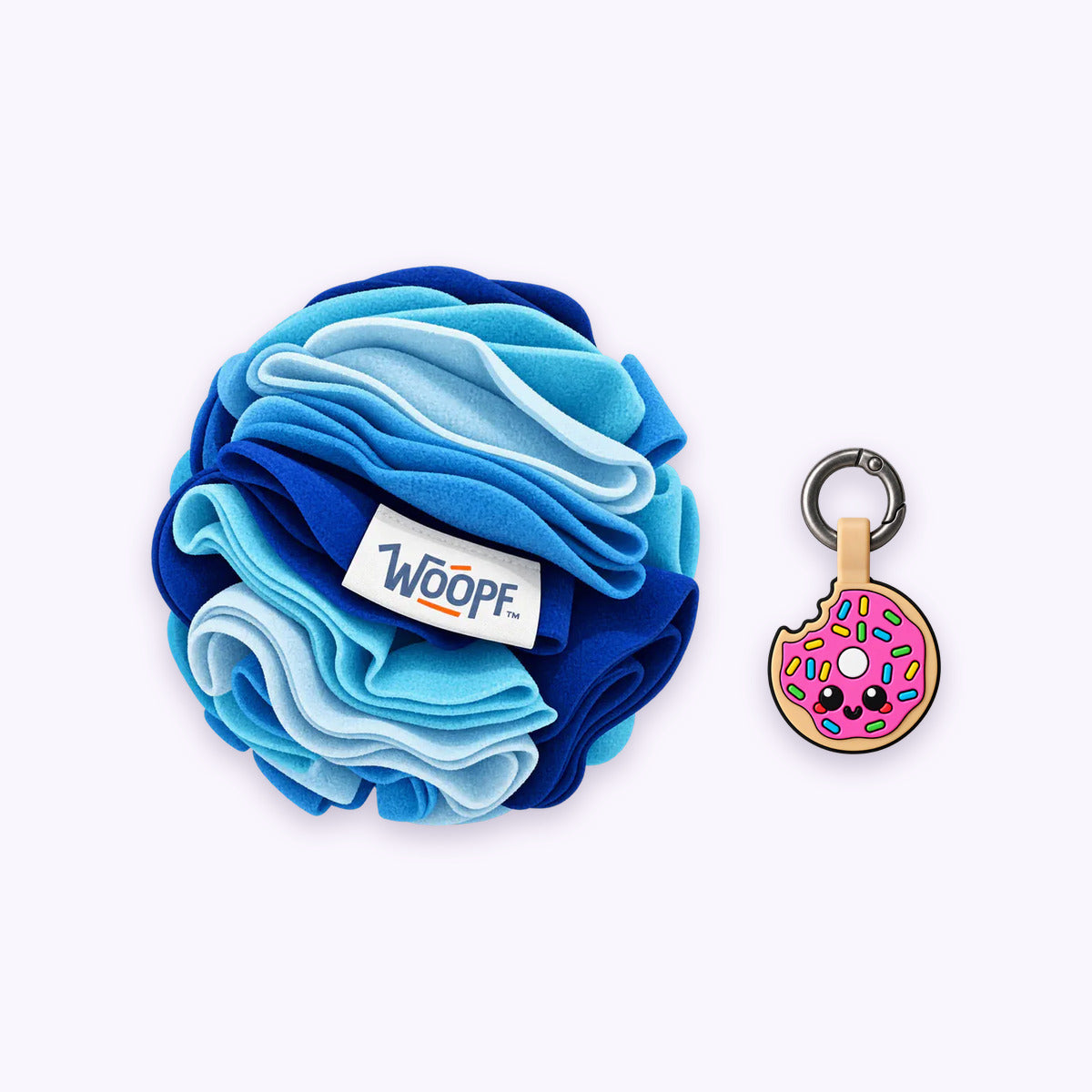 Blue | Tag & Sniff Bundle: The Blue Snuffle Ball with the Donut Smart ID Tag on a pale lavender background