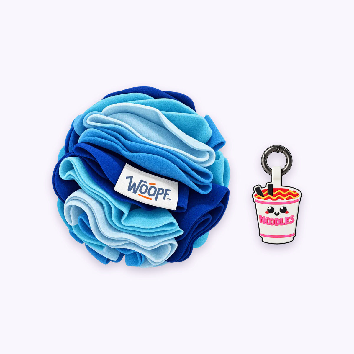 Blue | Tag & Sniff Bundle: The Blue Snuffle Ball with the Ramen Smart ID Tag on a pale lavender background