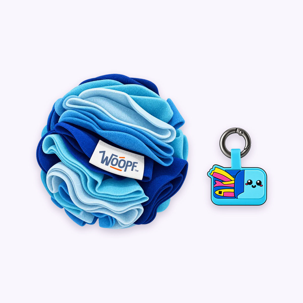 Blue | Tag & Sniff Bundle: The Blue Snuffle Ball with the Sardines Smart ID Tag on a pale lavender background