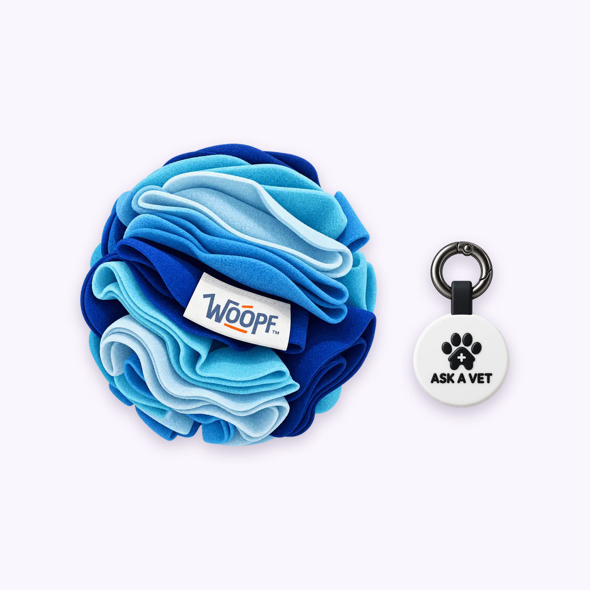 Blue | Tag & Sniff Bundle: The Blue Snuffle Ball with the White Smart ID Tag on a pale lavender background