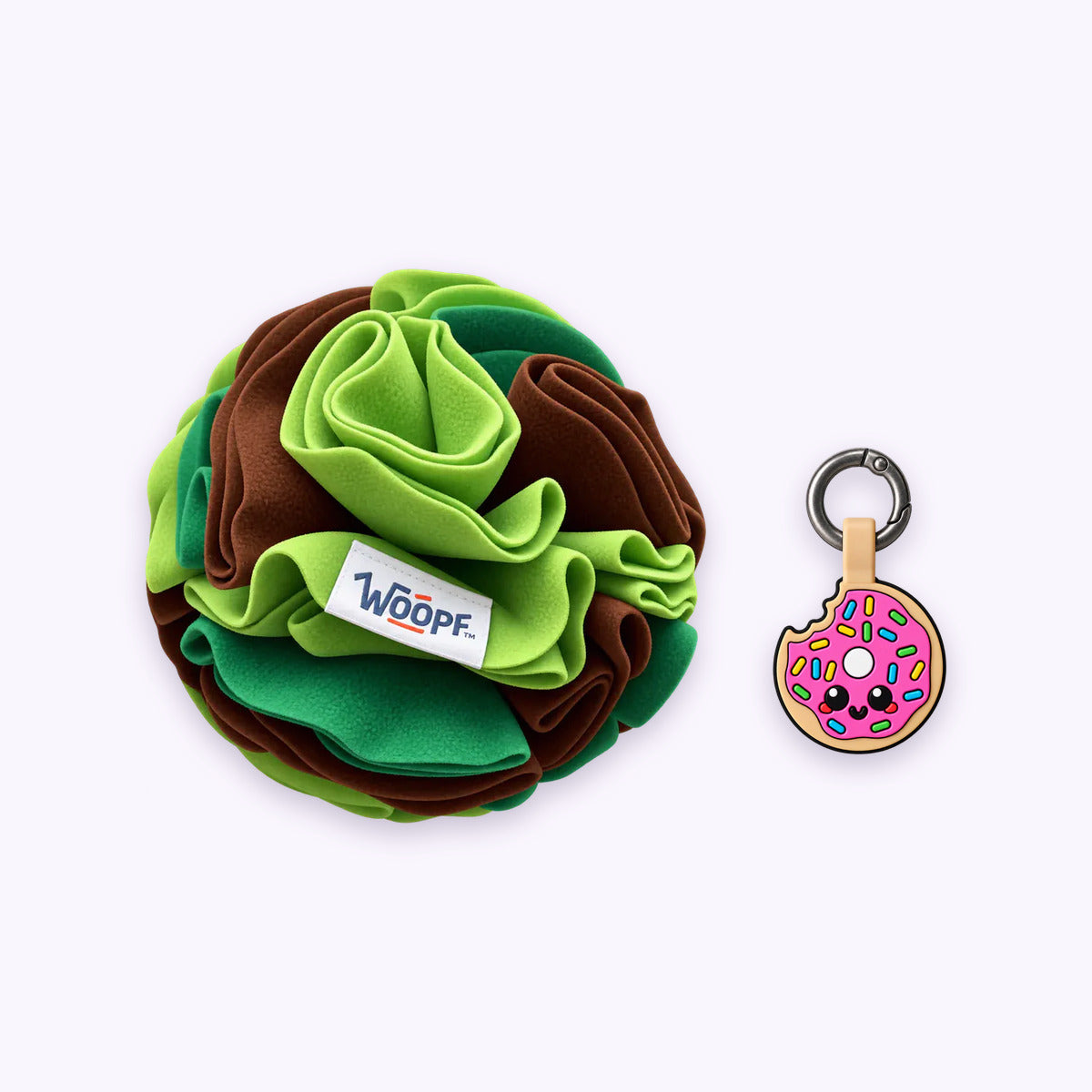Green | Tag & Sniff Bundle: The Green Snuffle Ball with the Donut Smart ID Tag on a pale lavender background