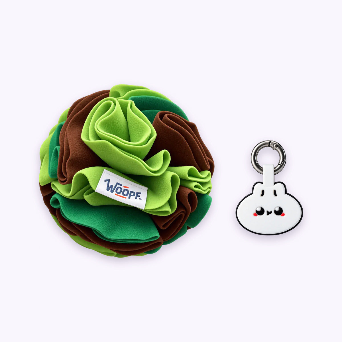 Green | Tag & Sniff Bundle: The Green Snuffle Ball with the Dumpling Smart ID Tag on a pale lavender background