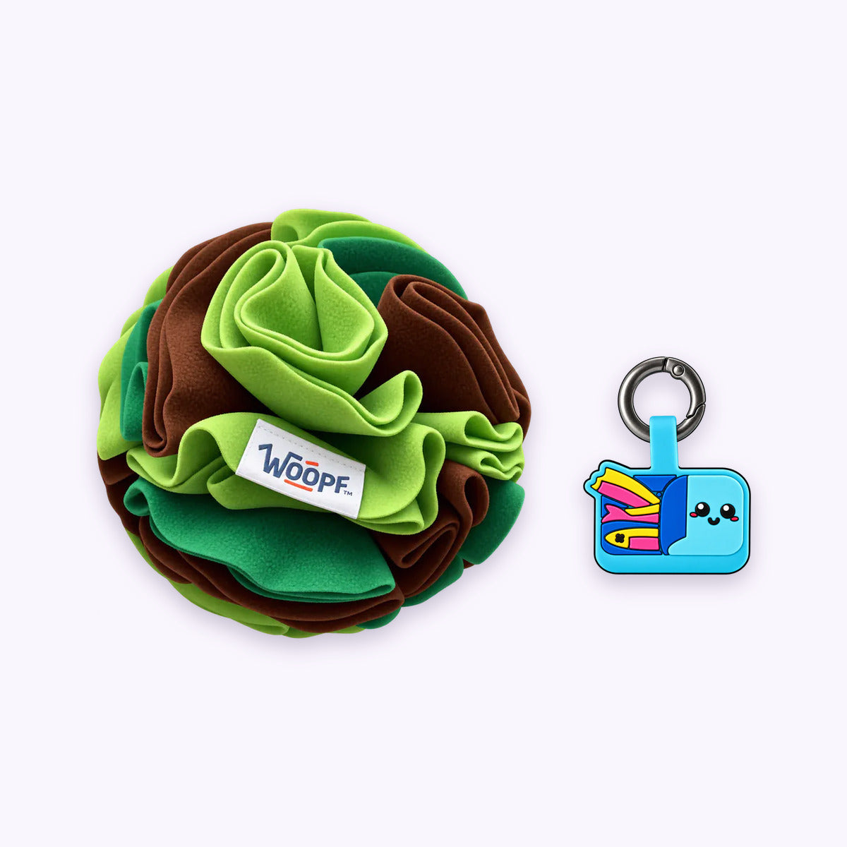Green | Tag & Sniff Bundle: The Green Snuffle Ball with the Sardines Smart ID Tag on a pale lavender background