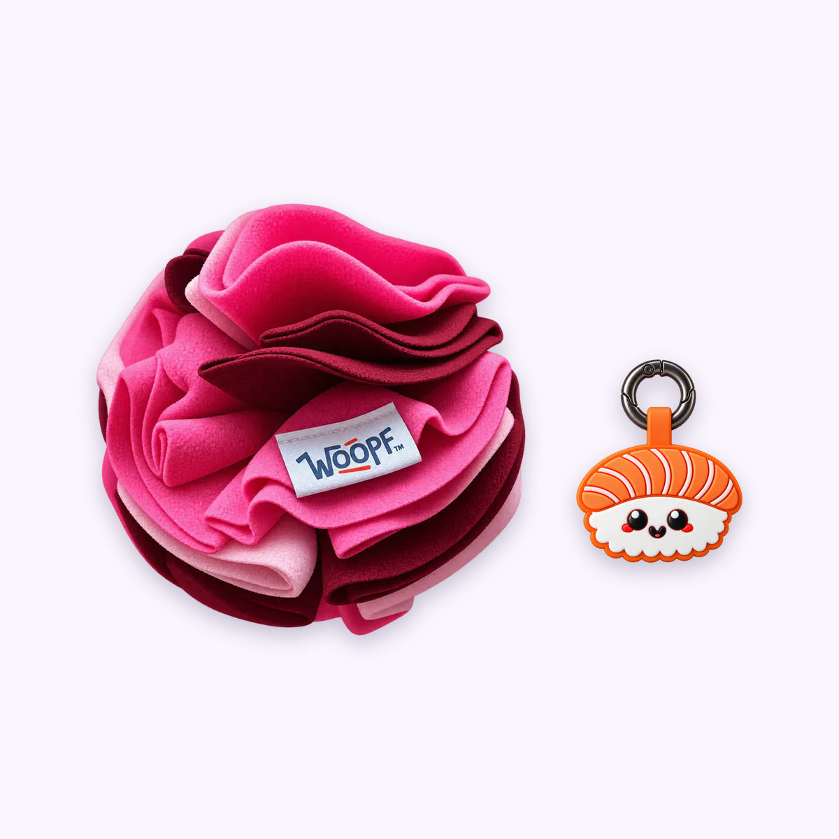Pink | Tag & Sniff Bundle: The Pink Snuffle Ball with the Salmon Sushi Smart ID Tag on a pale lavender background