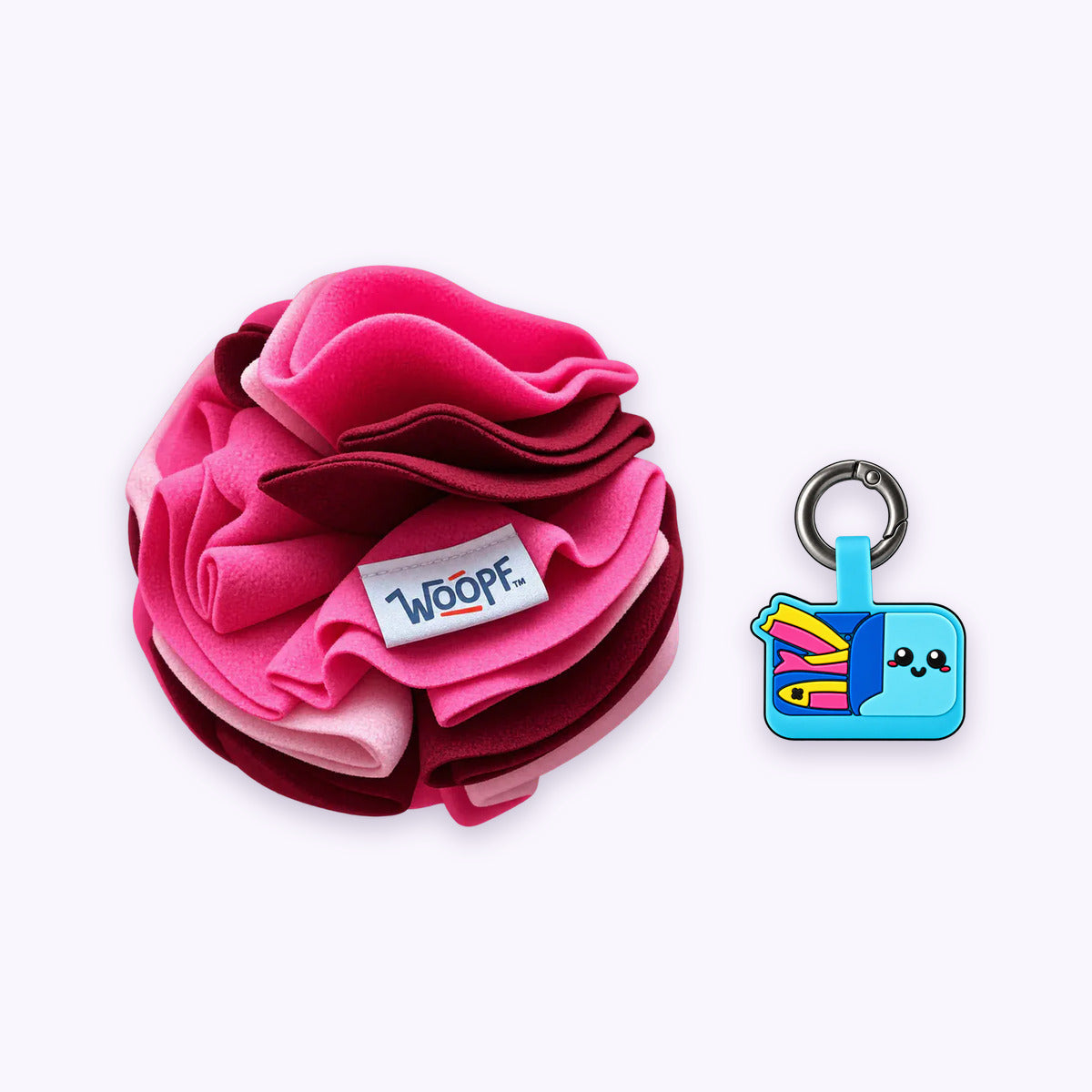 Pink | Tag & Sniff Bundle: The Pink Snuffle Ball with the Sardines Smart ID Tag on a pale lavender background