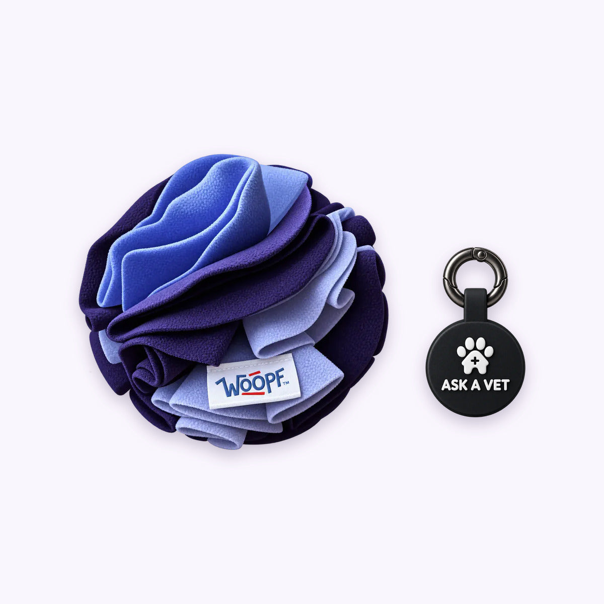 Purple | Tag & Sniff Bundle: The Purple Snuffle Ball with the Black Smart ID Tag on a pale lavender background