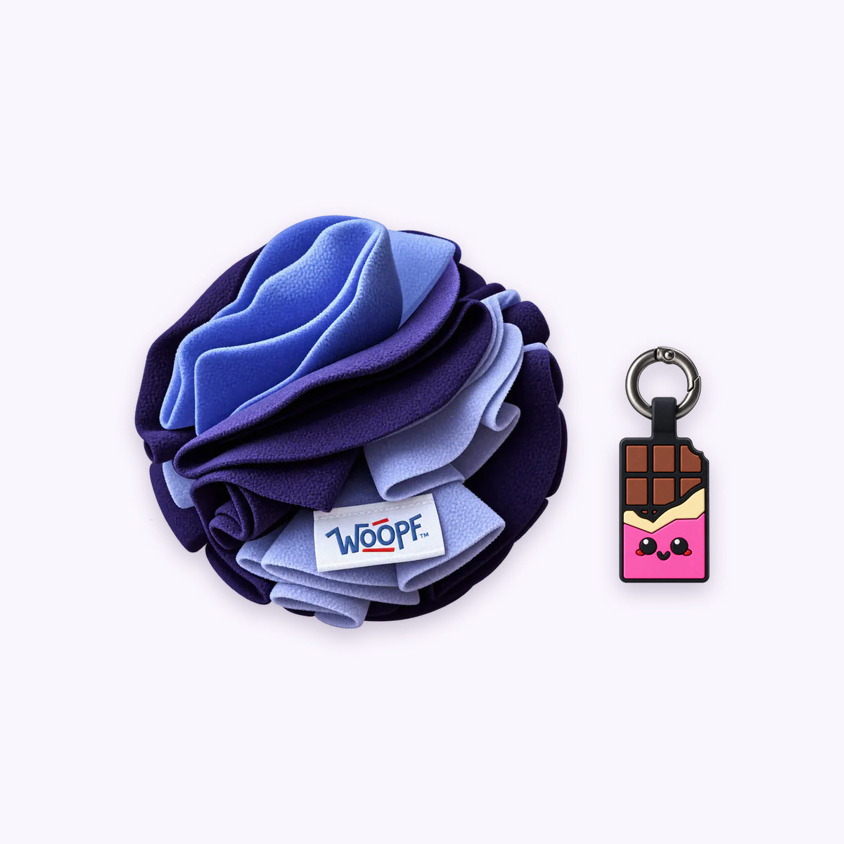 Purple | Tag & Sniff Bundle: The Purple Snuffle Ball with the Chocolate Pink Smart ID Tag on a pale lavender background