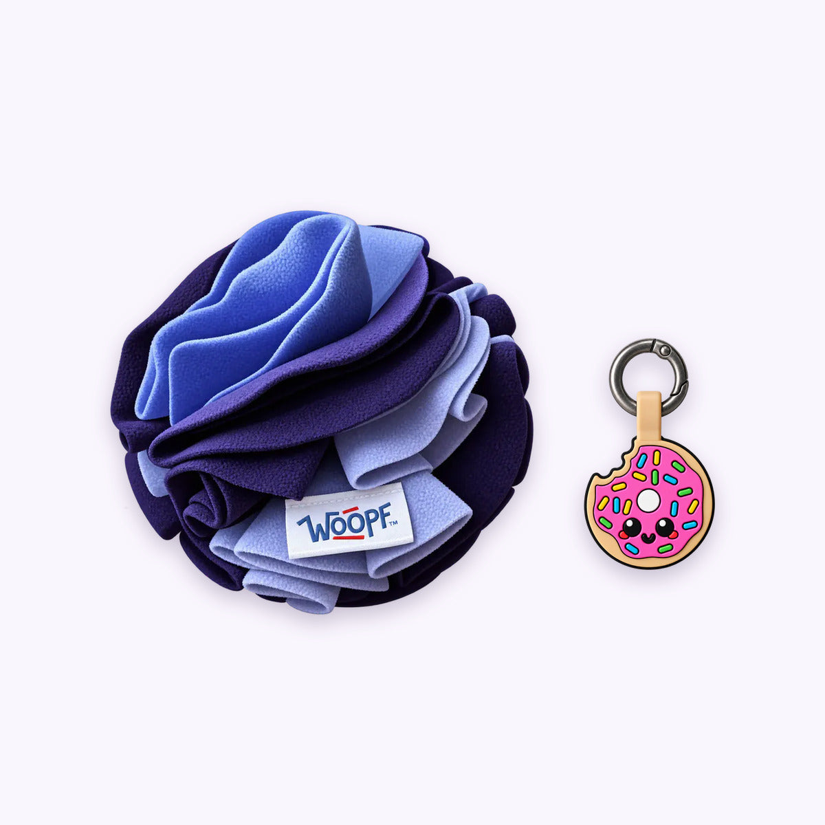 Purple | Tag & Sniff Bundle: The Purple Snuffle Ball with the Donut Smart ID Tag on a pale lavender background