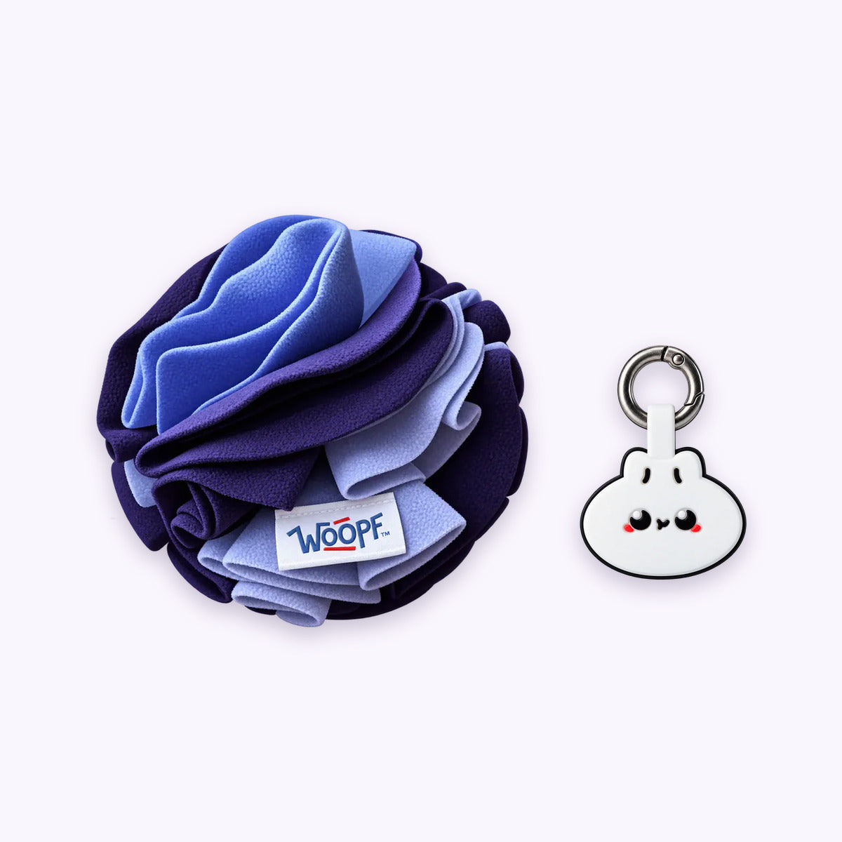 Purple | Tag & Sniff Bundle: The Purple Snuffle Ball with the Dumpling Smart ID Tag on a pale lavender background