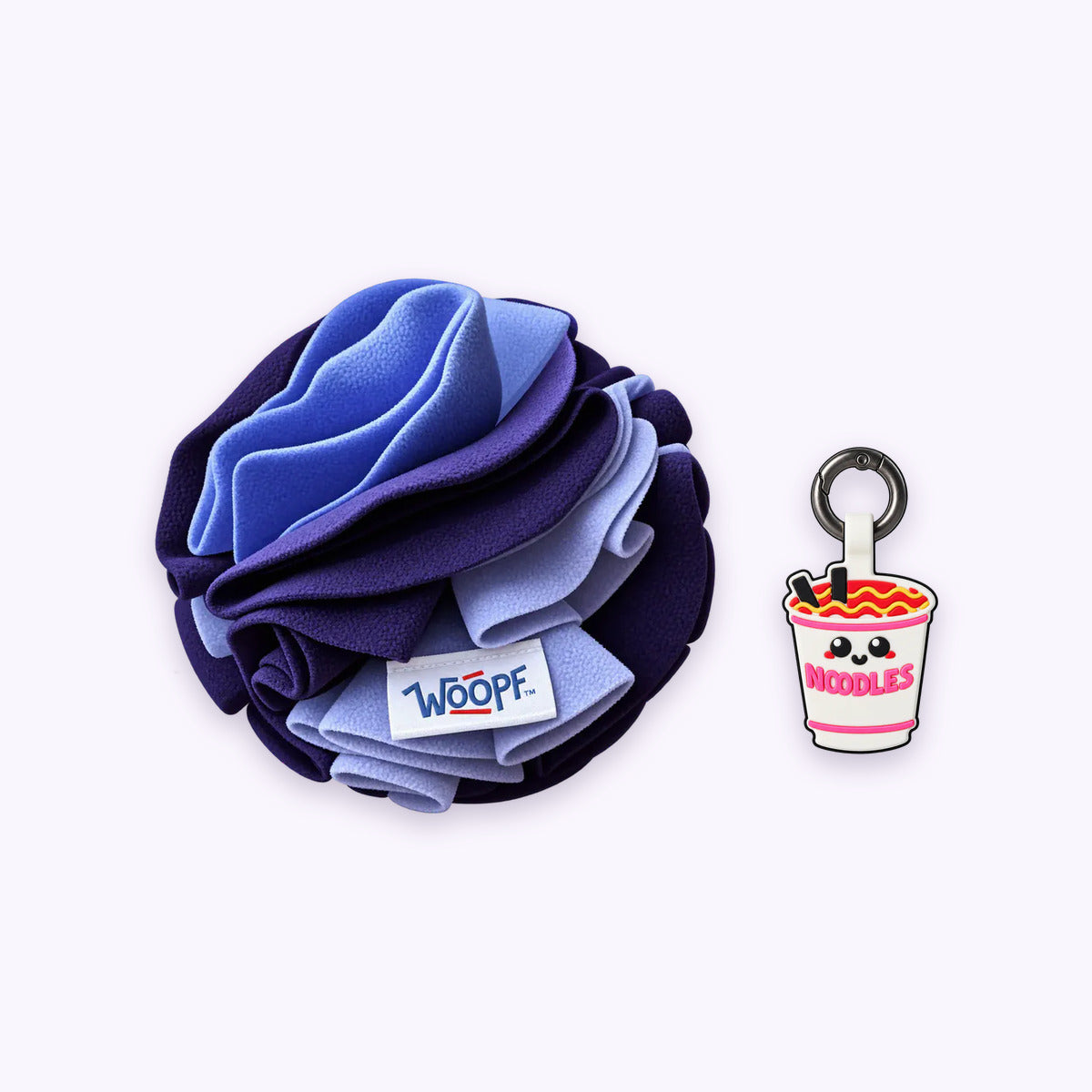 Purple | Tag & Sniff Bundle: The Purple Snuffle Ball with the Ramen Smart ID Tag on a pale lavender background