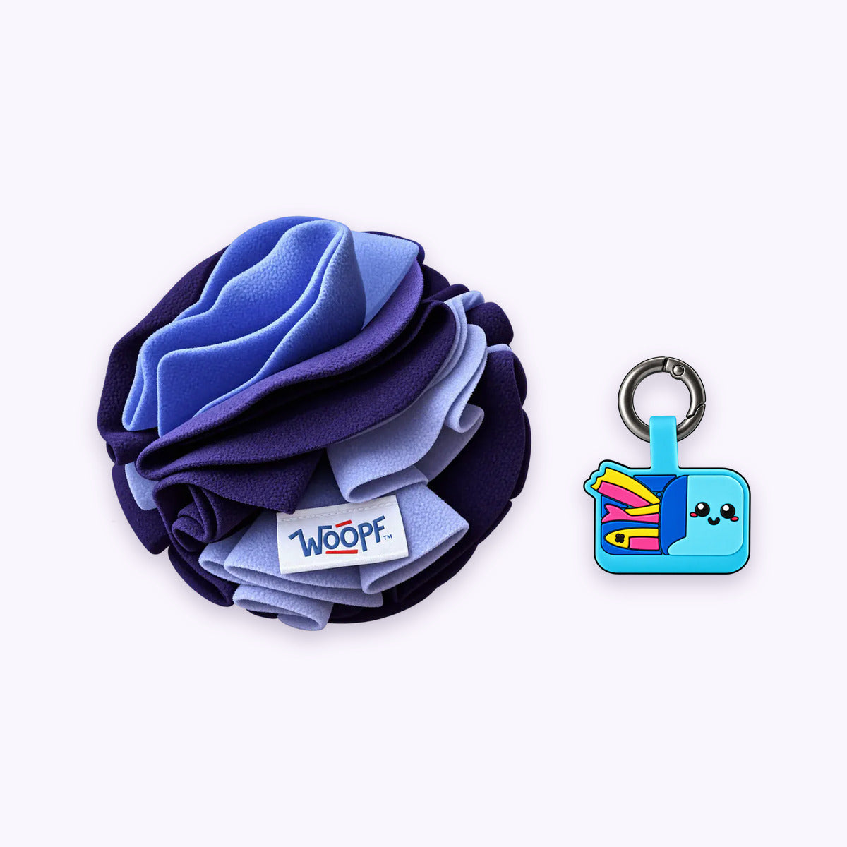 Purple | Tag & Sniff Bundle: The Purple Snuffle Ball with the Sardines Smart ID Tag on a pale lavender background