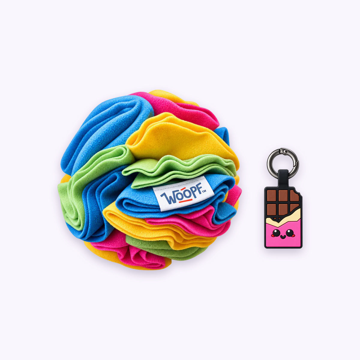 Rainbow | Tag & Sniff Bundle: The Rainbow Snuffle Ball with the Chocolate Pink Smart ID Tag on a pale lavender background