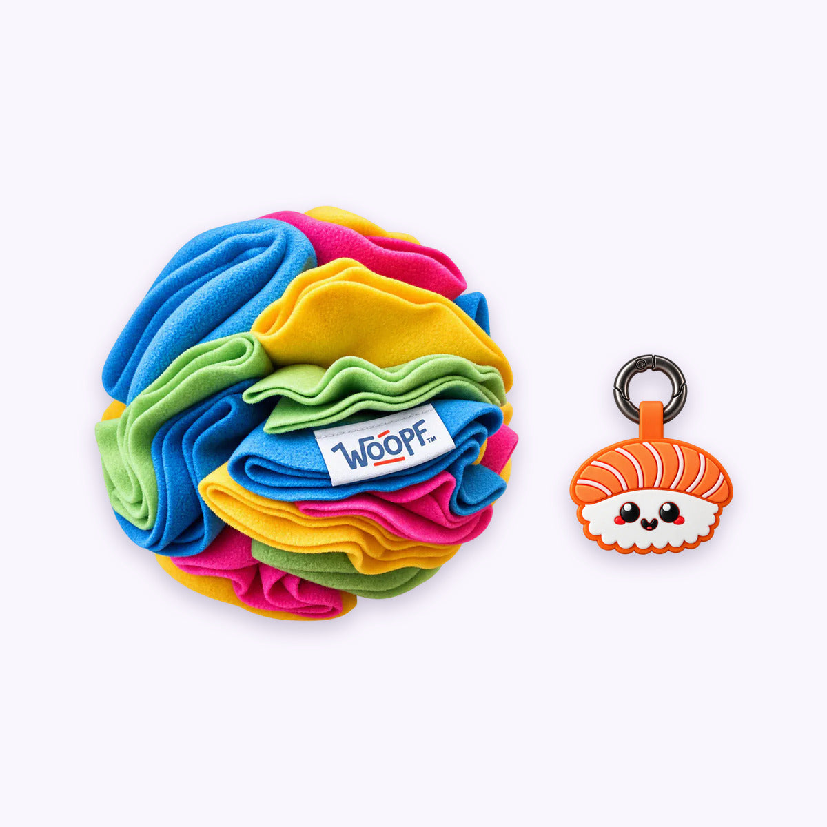 Rainbow | Tag & Sniff Bundle: The Rainbow Snuffle Ball with the Salmon Sushi Smart ID Tag on a pale lavender background