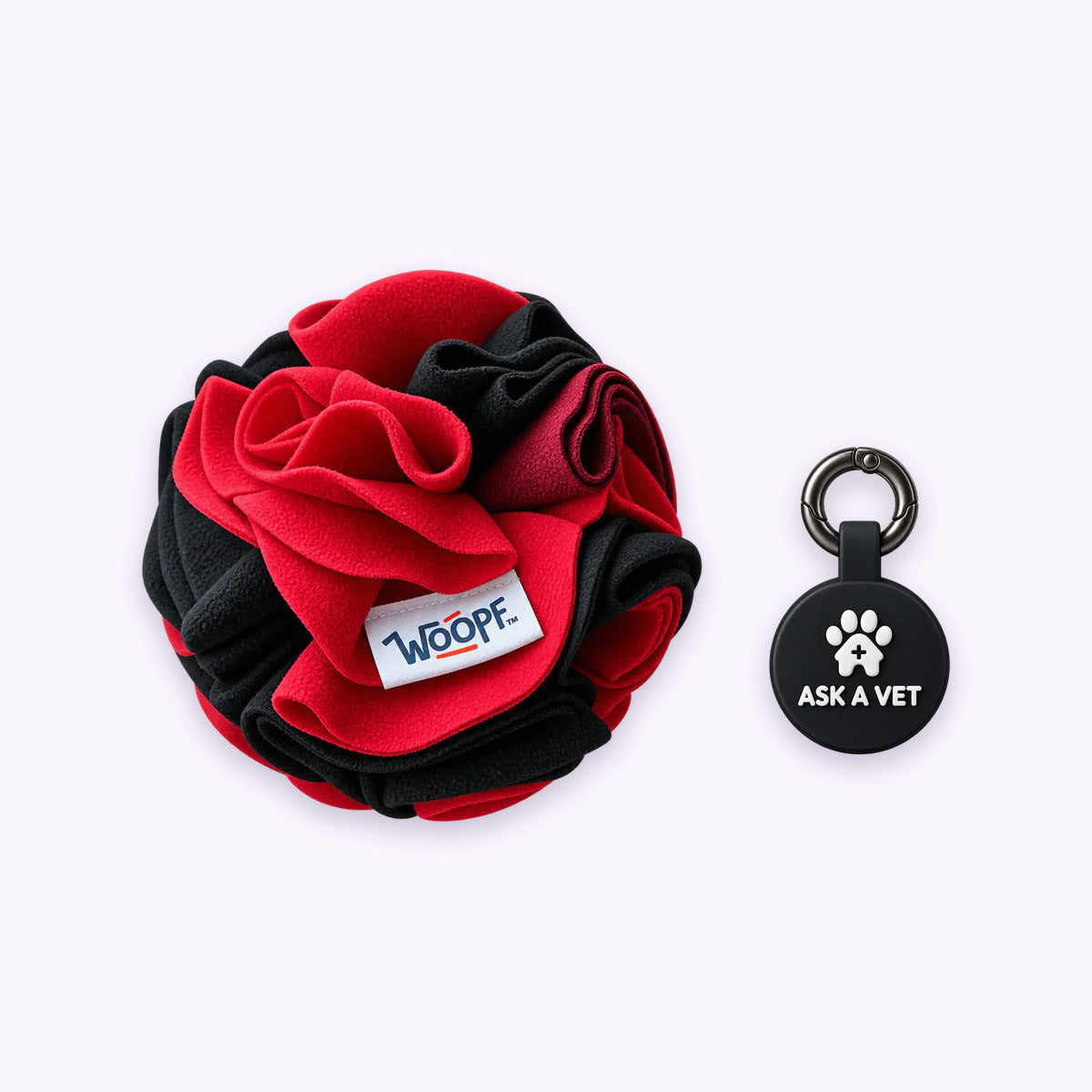 Red | Tag & Sniff Bundle: The Red Snuffle Ball with the Black Smart ID Tag on a pale lavender background