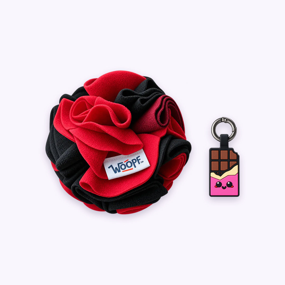Red | Tag & Sniff Bundle: The Red Snuffle Ball with the Chocolate Pink Smart ID Tag on a pale lavender background