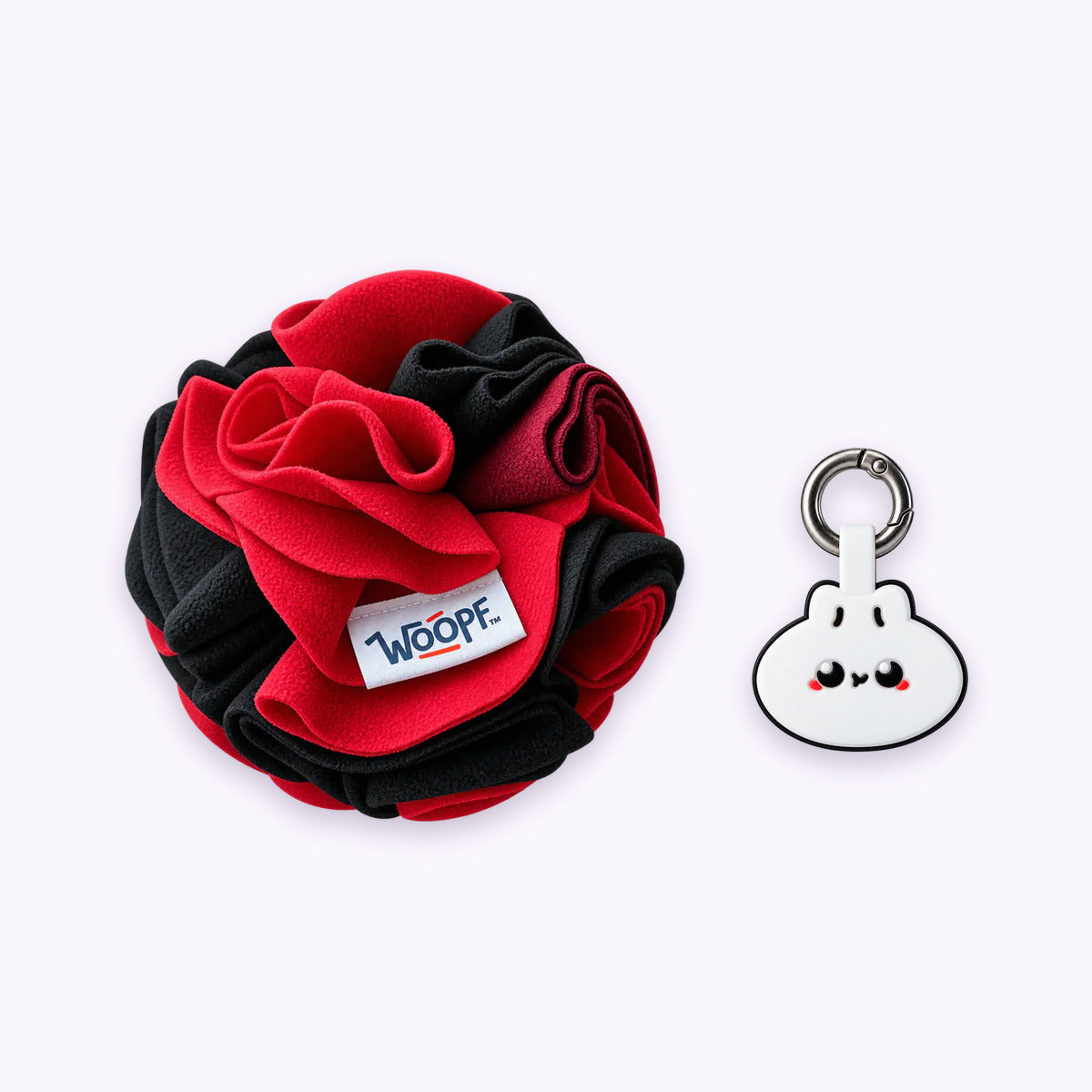 Red | Tag & Sniff Bundle: The Red Snuffle Ball with the Dumpling Smart ID Tag on a pale lavender background