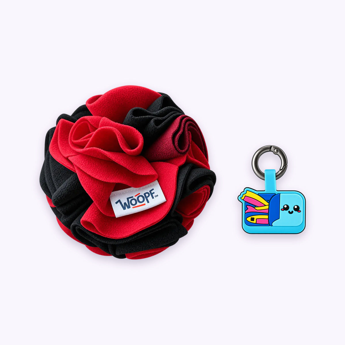 Red | Tag & Sniff Bundle: The Red Snuffle Ball with the Sardines Smart ID Tag on a pale lavender background