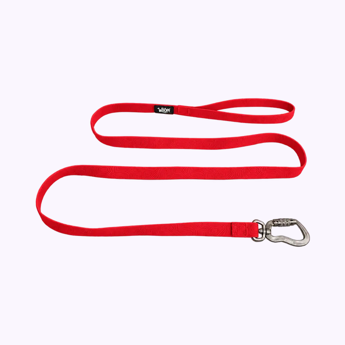 Sealskin Leash: The Red leash on its own on a pale lavender background